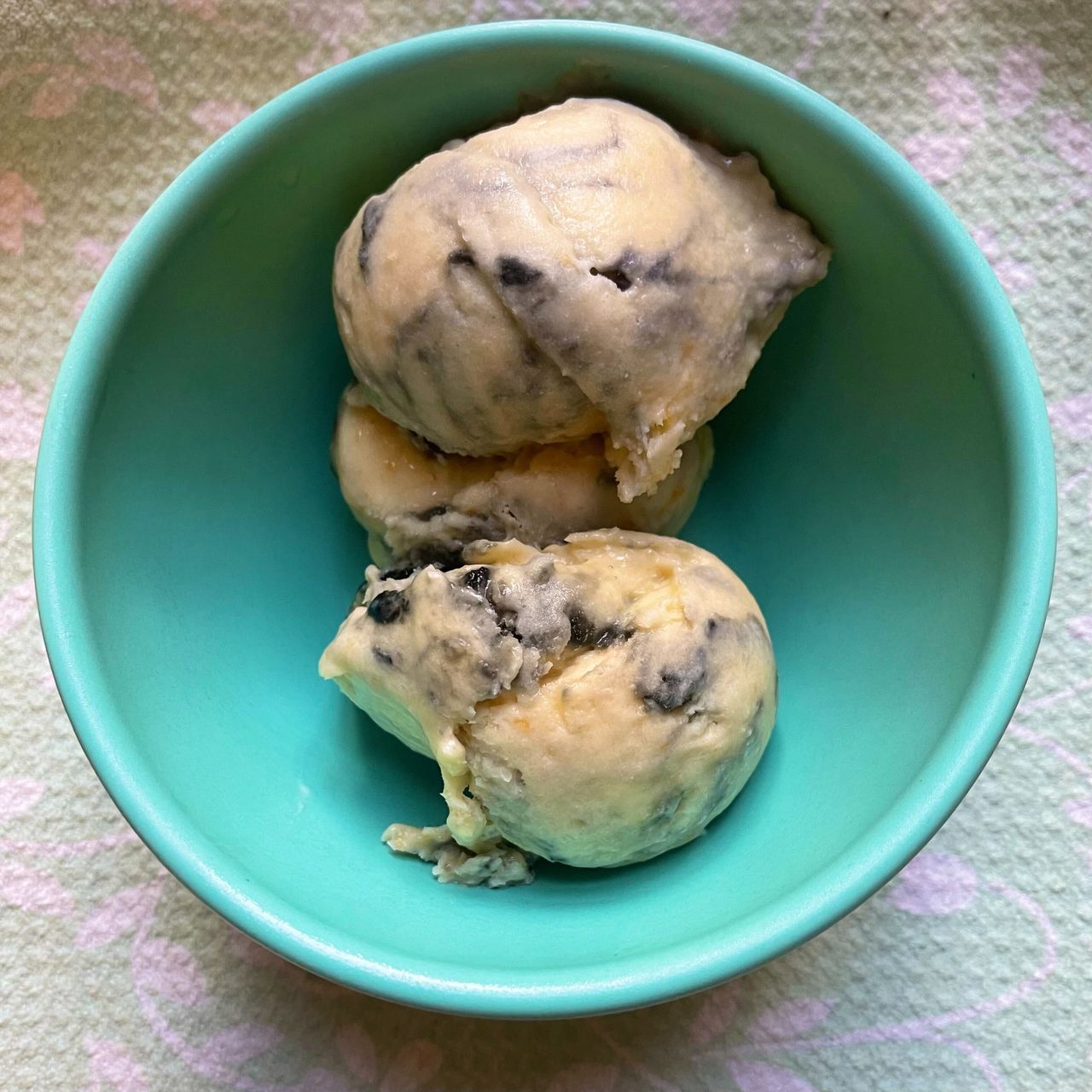 Tiger tail ice cream features an unlikely but harmonious merger of black licorice, orange, and dairy.
